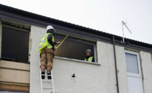 DSD Minister Views Progress on Window Replacement